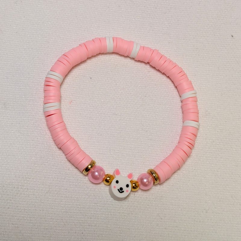 baby pink and white clay bead friendship bracelet with a bunny bead centre