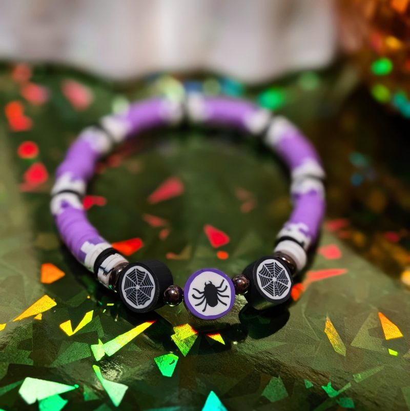 Halloween friendship bracelet with spider bead, web beads, with purple white and black clay beads — view 2
