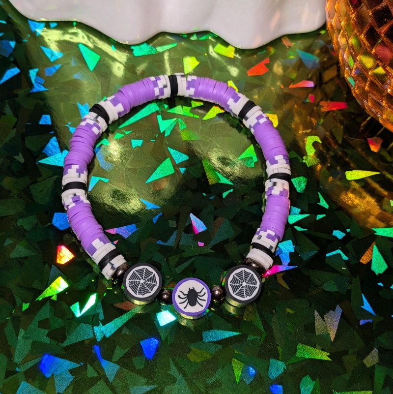 Halloween friendship bracelet with spider bead, web beads, with purple white and black clay beads — view 3