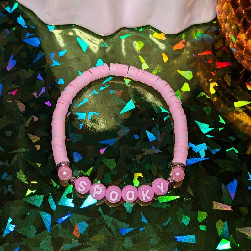 friendship bracelet that spells spooky with pink and light pink beads — view 3
