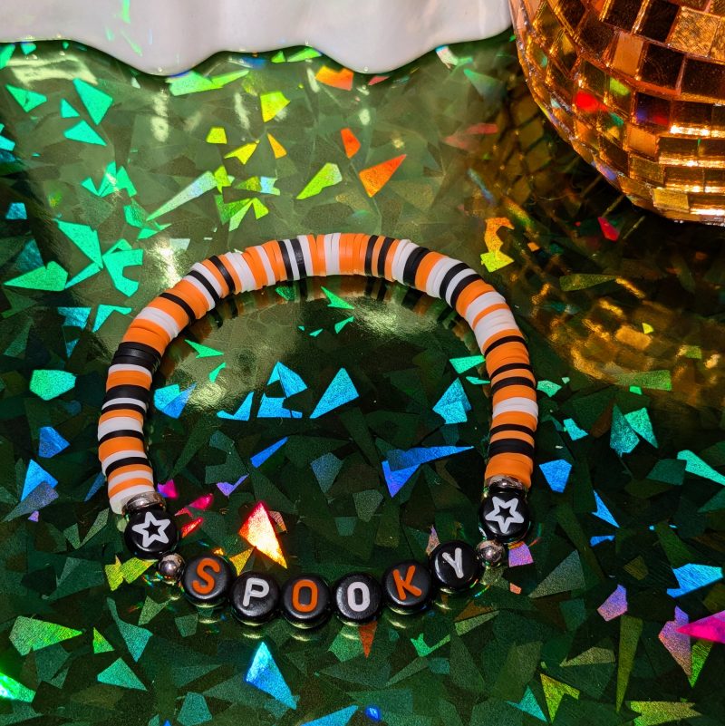 Halloween friendship bracelet spelling spooky with mixed orange white and black beads — view 3