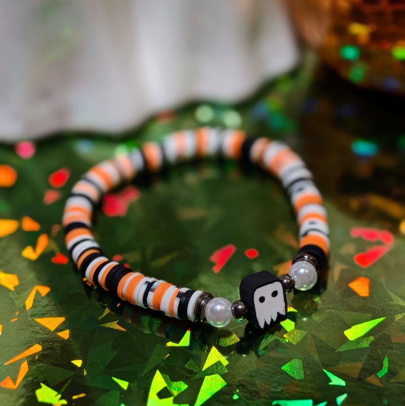 Halloween friendship bracelet with ghost bead with mixed orange white and black beads — view 2