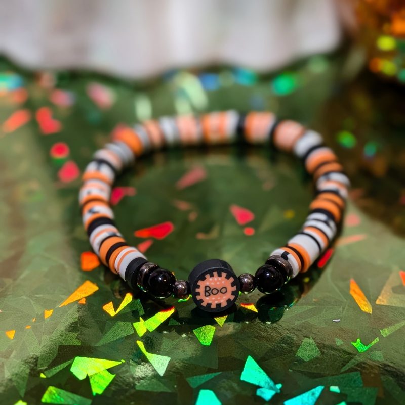 Halloween friendship bracelet with boo bead with mixed orange white and black beads — view 2