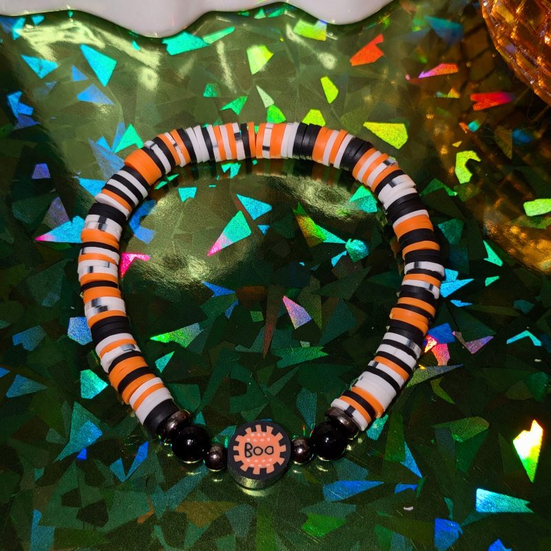 Halloween friendship bracelet with boo bead with mixed orange white and black beads — view 4